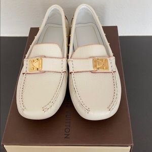 Louis Vuitton leather loafers with gold hardware